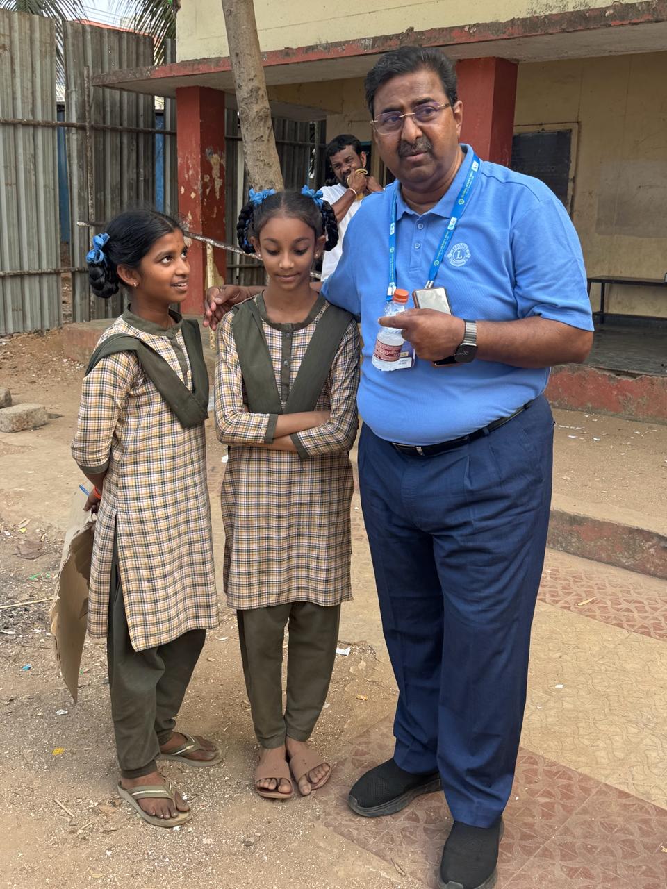 Vijay Raju interacting with school children during Global Service Week
