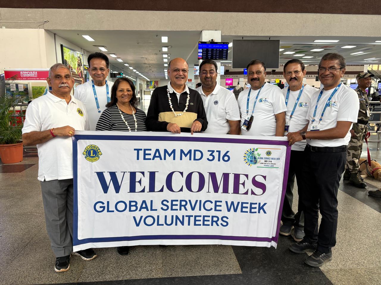 Vijay Raju welcoming international volunteers at Visakhapatnam airport
